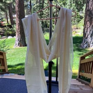 100% silk cream colored scarf.  Brand new with tags.